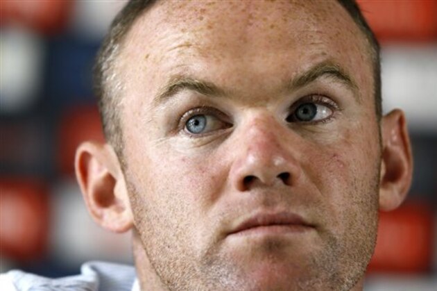 England’s Wayne Rooney listens during a press conference at Les Fontaines in Chantilly, France, Thursday, June 23, 2016. England will face Iceland in a Euro 2016 round of 16 soccer match in Nice on Monday, June 27. (AP Photo/Kirsty Wigglesworth)