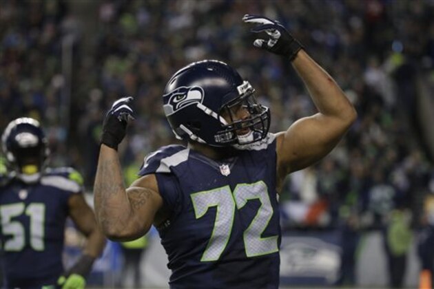 Seattle Seahawks defensive end Michael Bennett during an NFL football game against the Arizona Cardinals in the second half of an NFL football game, Sunday, Nov. 15, 2015, in Seattle. (AP Photo/Elaine Thompson)