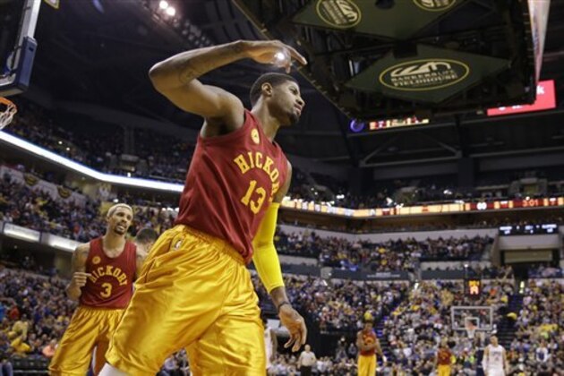 Indiana Pacers forward Paul George (13) celebrates being fouled by the Los Angeles Clippers during the second half of an NBA basketball game in Indianapolis, Tuesday, Jan. 26, 2016. The Clippers defeated the Pacers 91-89. (AP Photo/Michael Conroy)