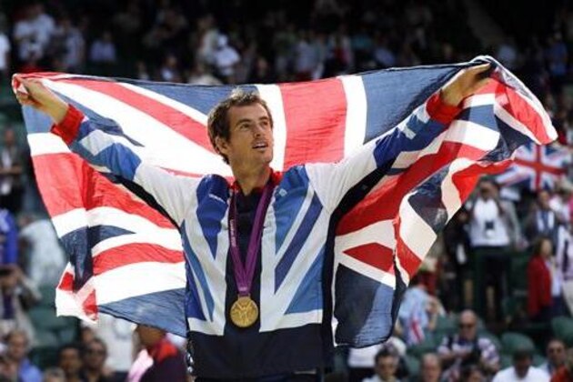 FILE - In this Aug. 5, 2012, file photo, gold medalist Andy Murray of Great Britain waves the British flag during the medal ceremony for the men's singles tennis at the 2012 Summer Olympics in London. Murray will be competing at the Rio Games.  (AP Photo/Elise Amendola, File)