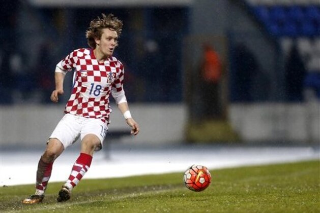 Croatia's Alen Halilovic controls the ball during the international friendly soccer match between  Croatia and Israel in Osijek, Croatia, Wednesday, March 23, 2016. (AP Photo/Darko Bandic)