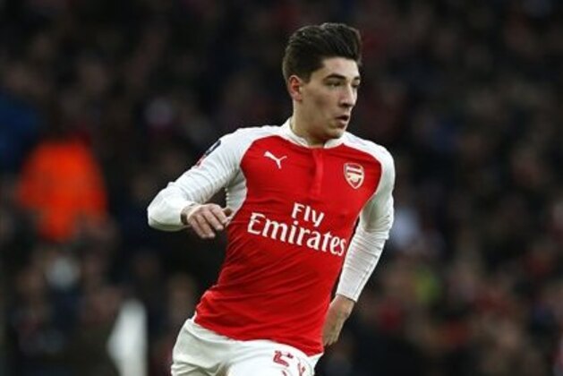 Arsenal's Hector Bellerin controls the ball during the English FA Cup third round soccer match between Arsenal and Sunderland at the Emirates stadium in London, Saturday, Jan. 9, 2016 . (AP Photo/Alastair Grant)