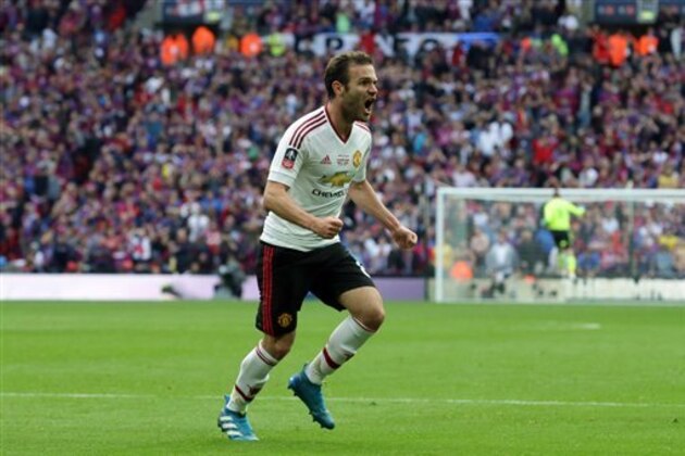 Manchester United’s Juan Mata celebrates scoring during the English FA Cup final soccer match between Manchester United and Crystal Palace at Wembley Stadium, London on Saturday May 21, 2016. (AP Photo/Tim Ireland)