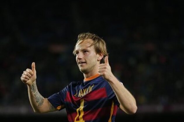 FC Barcelona's Ivan Rakitic celebrates after scoring against Celta Vigo during a Spanish La Liga soccer match at the Camp Nou stadium in Barcelona, Spain, Sunday, Feb. 14, 2016. (AP Photo/Manu Fernandez)