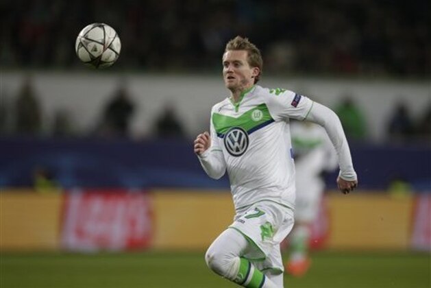 Wolfsburg's Andre Schuerrle during the Champions League round of sixteen 2nd leg soccer match between VfL Wolfsburg and KAA Gent in Wolfsburg, Germany, Tuesday, March 8, 2016. (AP Photo/Michael Sohn)