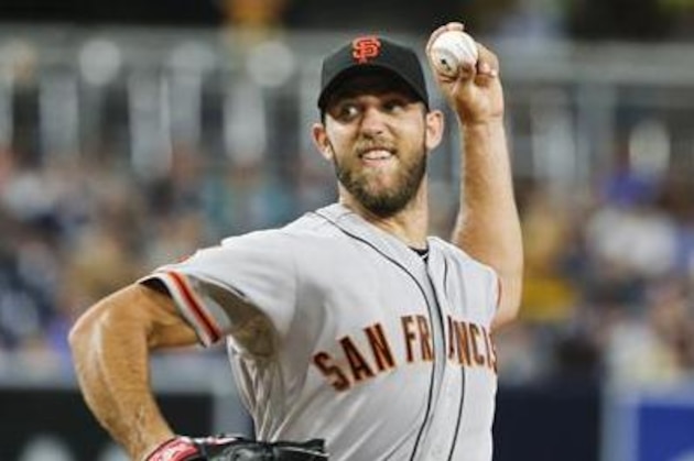 San Francisco Giants starting pitcher Madison Bumgarner works against the San Diego Padres during the first inning of a baseball game Friday, July 15, 2016, in San Diego. (AP Photo/Lenny Ignelzi)