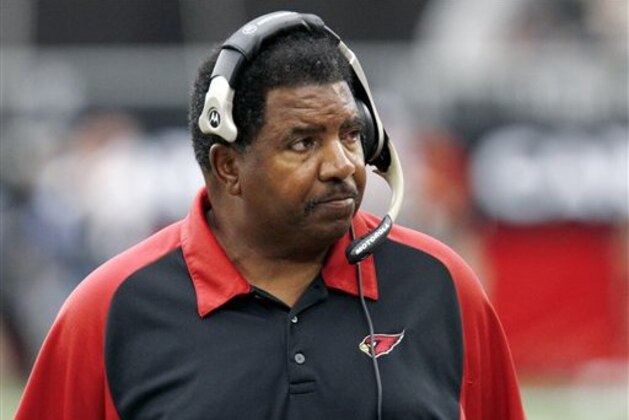 Arizona Cardinals head coach Dennis Green watches from the sidelines as his team competes against the St. Louis Rams during the second quarter of an NFL football game in Glendale, Ariz., Sunday, Sept. 24, 2006. (AP Photo/Rick Hossman)