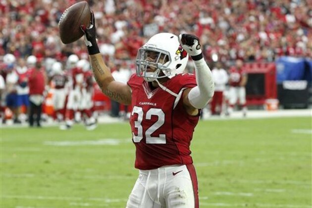 Arizona Cardinals free safety Tyrann Mathieu (32) celebrates his interception against the San Francisco 49ers during the first half of an NFL football game, Sunday, Sept. 27, 2015, in Glendale, Ariz.  (AP Photo/Ross D. Franklin)