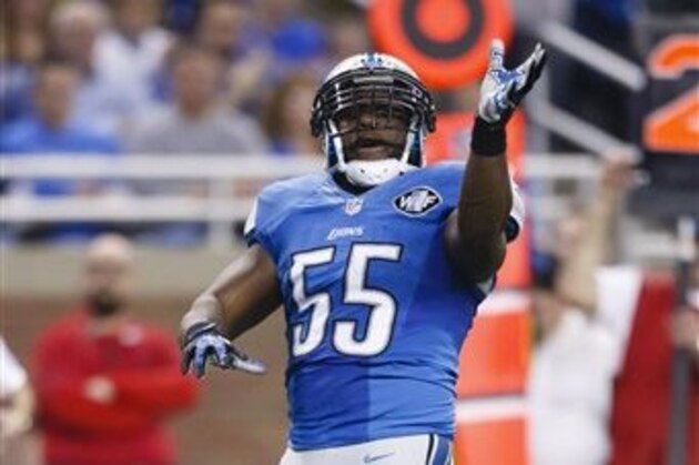 Detroit Lions middle linebacker Stephen Tulloch (55) celebrates a play against the Green Bay Packers during an NFL football game at Ford Field in Detroit, Thursday, Dec. 3, 2015. (AP Photo/Rick Osentoski)