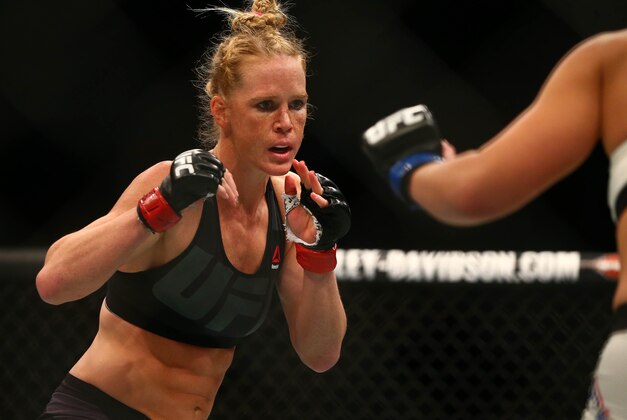 March 5, 2016; Las Vegas, NV, USA; Holly Holm fights against Miesha Tate during UFC 196 at MGM Grand Garden Arena. Mandatory Credit: Mark J. Rebilas-USA TODAY Sports