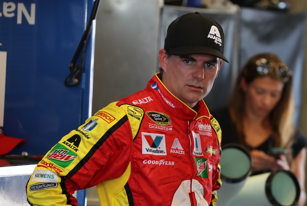 Jul 22, 2016; Indianapolis, IN, USA; Sprint Cup driver Jeff Gordon waits in his garage as his team works on his car during practice for the Combat Wounded Coalition 400 at the Brickyard at Indianapolis Motor Speedway. Mandatory Credit: Brian Spurlock-USA TODAY Sports