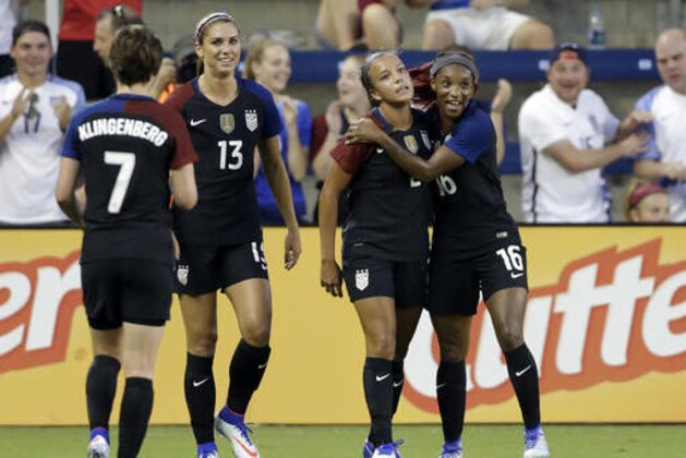 United States forward Mallory Pugh (2) is congratulated by Crystal Dunn (16) after scoring against Costa Rica in the first half of a women's international friendly soccer match, Friday, July. 22, 2016, in Kansas City, Kan. Looking on is defender Meghan Klingenberg (7) and forward Alex Morgan (13). (AP Photo/Colin E. Braley)