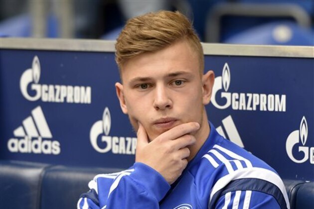 Schalke's Max Meyer sits on the bench during the German Bundesliga soccer match between FC Schalke 04 and VfB Stuttgart in Gelsenkirchen,  Germany, Saturday, May 2, 2015. (AP Photo/Martin Meissner)
