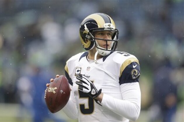 St. Louis Rams quarterback Nick Foles throws during warmups before an NFL football game against the Seattle Seahawks, Sunday, Dec. 27, 2015, in Seattle. (AP Photo/Stephen Brashear)