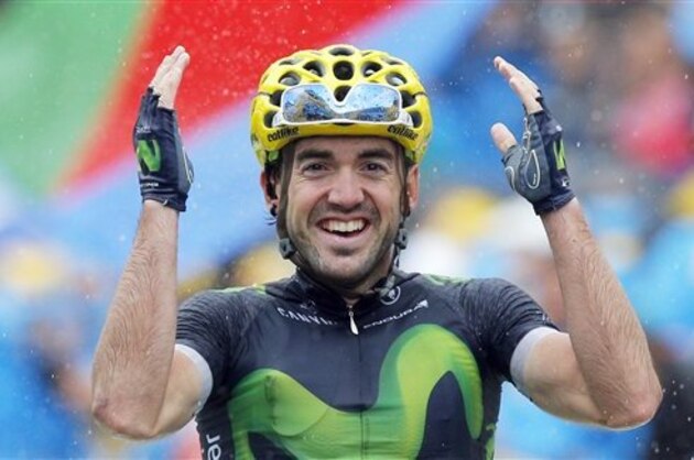Spain’s Jon Izaguirre Insausti celebrates as he crosses the finish line to win the twentieth stage of the Tour de France cycling race over 146.5 kilometers (90.7 miles) with start in Megeve and finish in Morzine-Avoriaz, France, Saturday, July 23, 2016. (AP Photo/Christophe Ena)