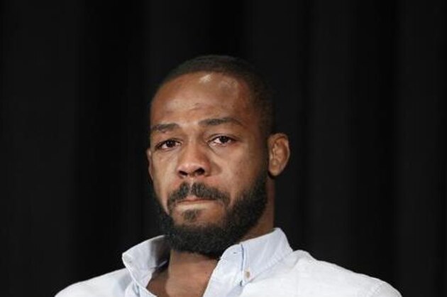 Mixed martial arts fighter Jon Jones cries as he speaks during a news conference, Thursday, July 7, 2016, in Las Vegas. Jones was scheduled to fight Daniel Cormier at UFC 200 but was pulled from the event because of a potential violation of the UFC's anti-doping policy. (AP Photo/John Locher)
