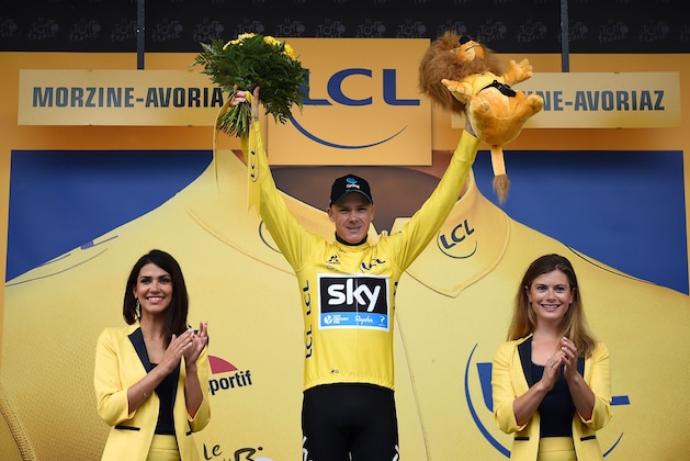 Great Britain's Christopher Froome celebrates his overall leader yellow jersey on the podium at the end of the 146,5 km twentieth stage of the 103rd edition of the Tour de France cycling race on July 23, 2016 between Megeve and Morzine-Avoriaz, French Alps. / AFP / LIONEL BONAVENTURE        (Photo credit should read LIONEL BONAVENTURE/AFP/Getty Images)