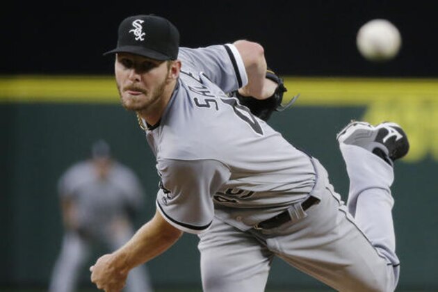 FILE - In this Monday, July 18, 2016, file photo, Chicago White Sox starting pitcher Chris Sale throws to a Seattle Mariners batter during a baseball game in Seattle. Sale has been scratched from his start against the Detroit Tigers after he was involved in what the team says was a