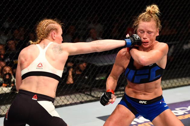 CHICAGO, IL - JULY 23:  (L-R) Valentina Shevchenko of Kyrgyzstan punches Holly Holm in their women's bantamweight bout during the UFC Fight Night event at the United Center on July 23, 2016 in Chicago, Illinois. (Photo by Josh Hedges/Zuffa LLC/Zuffa LLC via Getty Images)