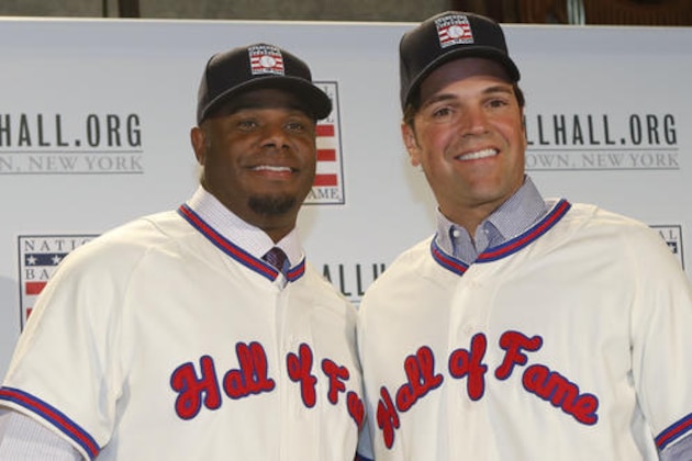 FILE - In this Jan. 7, 2016, file photo, Ken Griffey Jr., left, poses for a photograph with Mike Piazza at a press conference announcing they are both elected into the 2016 National Baseball Hall of Fame, in New York. The Seattle Mariners made Ken Griffey Jr. the first pick of the 1987 amateur draft and a year later the Dodgers selected Mike Piazza on the 62nd round with the 1,390th pick. Both left indelible imprints on the game and will be rewarded Sunday with induction into the Baseball Hall of Fame.  (AP Photo/Kathy Willens, File)