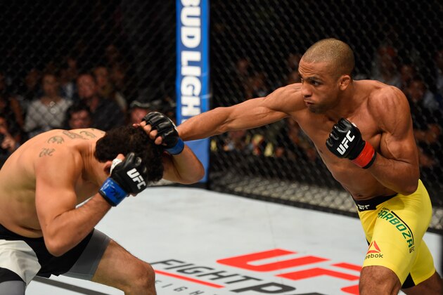 CHICAGO, IL - JULY 23:  (R-L) Edson Barboza of Brazil punches Gilbert Melendez in their lightweight bout during the UFC Fight Night event at the United Center on July 23, 2016 in Chicago, Illinois. (Photo by Josh Hedges/Zuffa LLC/Zuffa LLC via Getty Images)