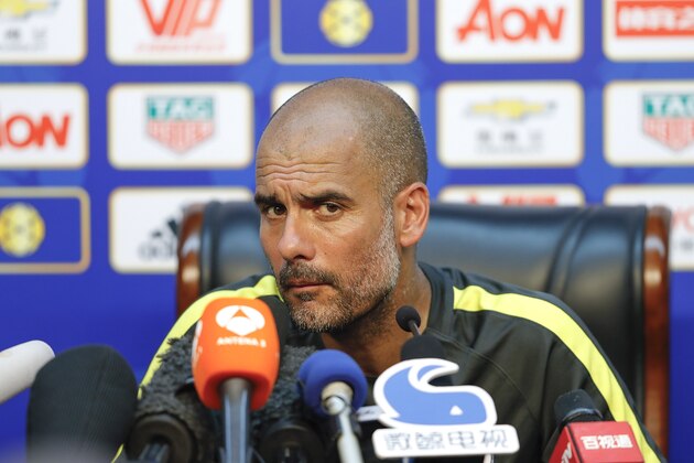 BEIJING, CHINA - JULY 24:  Manchester City's manager Pep Guardiola attends a press conference for 2016 International Champions Cup match between Manchester City and Manchester United at Olympic Sports Center Stadium on July 24, 2016 in Beijing, China.  (Photo by Lintao Zhang/Getty Images)