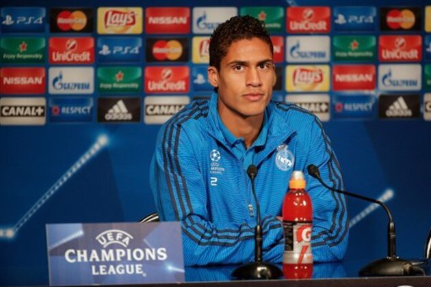 Real Madrid's Raphael Varane pauses during a press conference prior to a training session, at the Parc des Princes stadium, in Paris, France, Tuesday, Oct. 20, 2015. Real Madrid will face Paris Saint-Germain in a Champions League soccer match on Wednesday. (AP Photo/Thibault Camus)