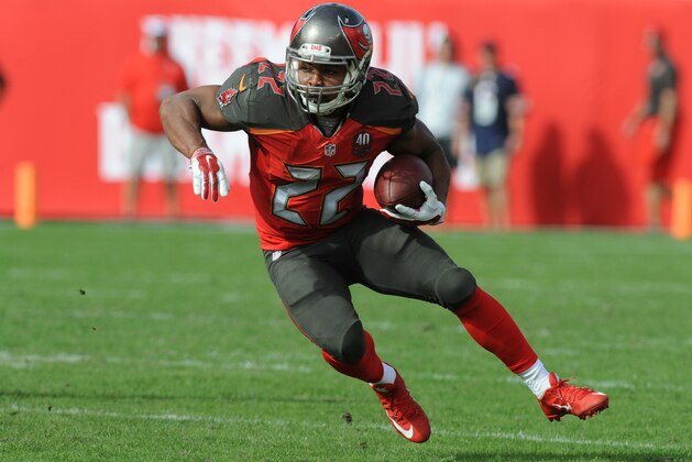 TAMPA, FL - DECEMBER 27: Running back Doug Martin #22 of the Tampa Bay Buccaneers runs with the ball against the Chicago Bears in the first second quarter at Raymond James Stadium on December 27, 2015 in Tampa, Florida. (Photo by Cliff McBride/Getty Images)