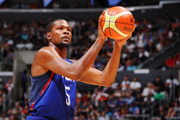LOS ANGELES, CA - JULY 24:  Kevin Durant #5 of the USA Basketball Men's National Team shoots a free throw against China on July 24, 2016 at STAPLES Center in Los Angeles, California. NOTE TO USER: User expressly acknowledges and agrees that, by downloading and/or using this Photograph, user is consenting to the terms and conditions of the Getty Images License Agreement. Mandatory Copyright Notice: Copyright 2016 NBAE (Photo by Juan Ocampo/NBAE via Getty Images)