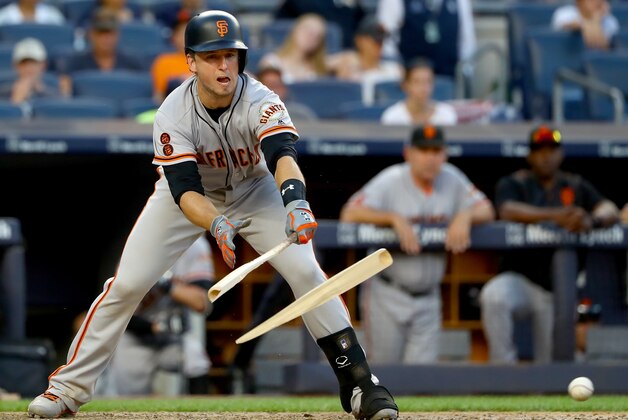 NEW YORK, NY - JULY 23:  Buster Posey #28 of the San Francisco Giants breaks his bat as he hits against the New York Yankees in the 11th inning on July 23, 2016 at Yankee Stadium in the Bronx borough of New York City.  (Photo by Elsa/Getty Images)