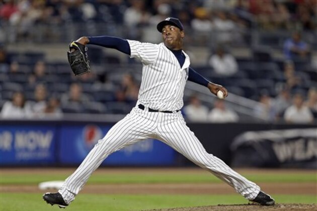 New York Yankees relief pitcher Aroldis Chapman (54) delivers a pitch during the ninth inning of a baseball game against the Boston Red Sox on Sunday, July 17, 2016, in New York. The Yankees won 3-1. (AP Photo/Adam Hunger)