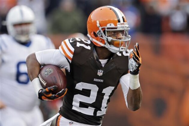 FILE - In this Dec. 7, 2014, file photo, Cleveland Browns cornerback Justin Gilbert returns an interception for a touchdown against the Indianapolis Colts in the third quarter of an NFL football game in Cleveland. Gilbert says he was hurt by public comments from some teammates who said he wasted this season. In the past week, safety Donte Whitner and Karlos Dansby were critical of Gilbert, saying he needed to grow up as a player and person. (AP Photo/Tony Dejak, File)