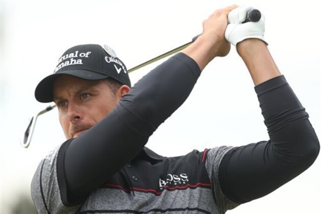 Henrik Stenson of Sweden plays his tee shit from the12th during the final round of the British Open Golf Championship at the Royal Troon Golf Club in Troon, Scotland, Sunday, July 17, 2016. (AP Photo/Peter Morrison)