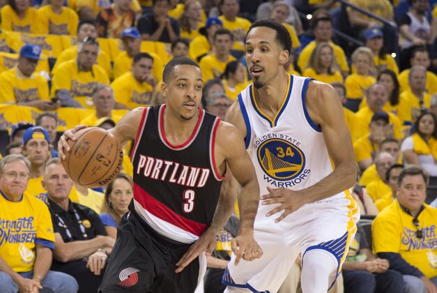 May 1, 2016; Oakland, CA, USA; Portland Trail Blazers guard C.J. McCollum (3) dribbles the basketball against Golden State Warriors guard Shaun Livingston (34) during the second quarter in game one of the second round of the NBA Playoffs at Oracle Arena. Mandatory Credit: Kyle Terada-USA TODAY Sports