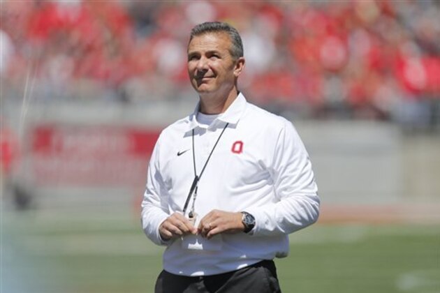 Ohio State head coach Urban Meyer watches Ohio State's NCAA college football spring game Saturday, April 16, 2016, in Columbus, Ohio. (AP Photo/Jay LaPrete)