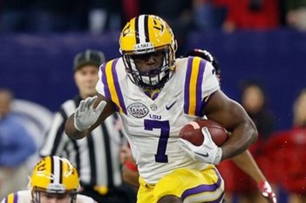 LSU running back Leonard Fournette (7) rushes past Texas Tech defensive back Keenon Ward (15) during the second half of the Texas Bowl NCAA football game Tuesday, Dec. 29, 2015, in Houston. LSU won 56-27. (AP Photo/Bob Levey)
