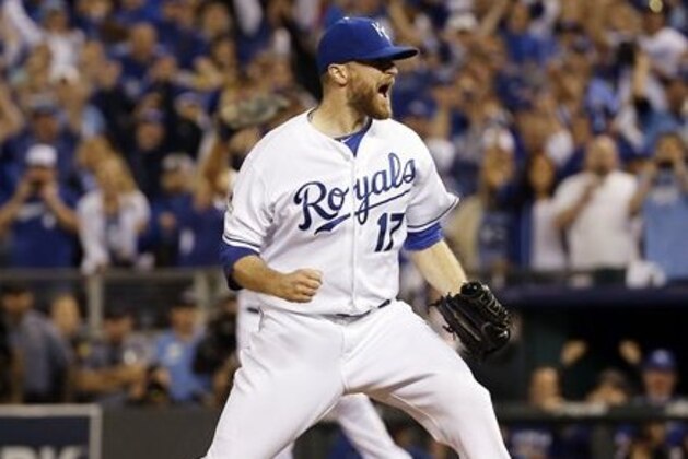 Kansas City Royals relief pitcher Wade Davis celebrates their 4-3 win against the Toronto Blue Jays in Game 6 of baseball's American League Championship Series on Friday, Oct. 23, 2015, in Kansas City, Mo. (AP Photo/Matt Slocum)