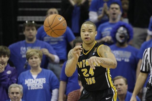 Southern Miss' Jonathan Mills passes the ball during the first half of an NCAA basketball game against Memphis in Memphis, Tenn., Saturday, Feb. 23, 2013. (AP Photo/Danny Johnston)