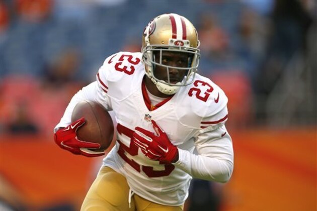 San Francisco 49ers running back Reggie Bush (23) warms up prior to an NFL preseason football game against the Denver Broncos, Saturday, Aug. 29, 2015, in Denver. (AP Photo/Joe Mahoney)