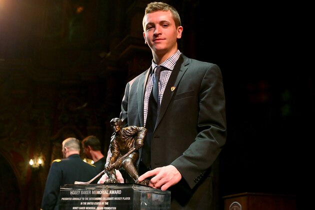 TAMPA, FLORIDA - APRIL 08:  Jimmy Vesey of Harvard University and Hobey Baker Award winner poses with the trophy after the 2016 Hobey Baker Memorial Award ceremony at Tampa Theatre on April 8, 2016 in Tampa, Florida.The Hobey Baker Award is given to college hockey's best player.  (Photo by Elsa/Getty Images)