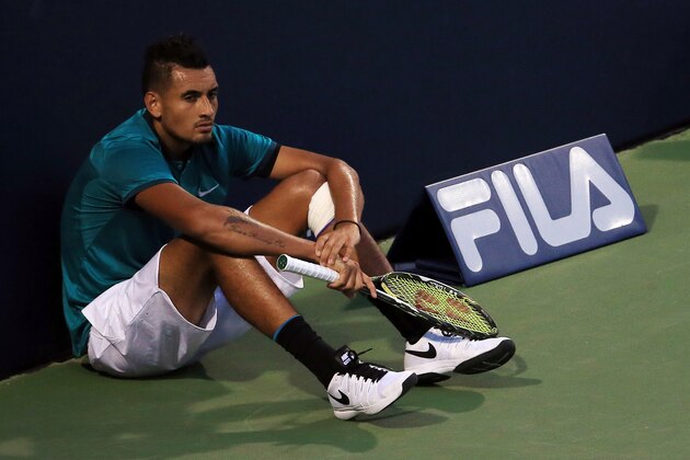TORONTO, ON - JULY 25:  Nick Kyrgios of Australia sits at the end of the court and waits for the final game in his match against Denis Shapovalov of Canada during Day 1 of the Rogers Cup at the Aviva Centre on July 25, 2016 in Toronto, Ontario, Canada.  (Photo by Vaughn Ridley/Getty Images)