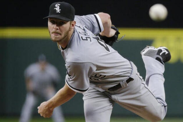 FILE - In this Monday, July 18, 2016, file photo, Chicago White Sox starting pitcher Chris Sale throws to a Seattle Mariners batter during a baseball game in Seattle. Sale has been scratched from his start against the Detroit Tigers after he was involved in what the team says was a