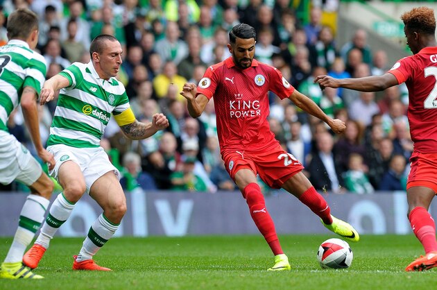 Leicester City's Algerian midfielder Riyad Mahrez (2nd R) vies with Celtic's Scottish midfielder Scott Brown (2nd L) and Celtic's Swedish defender Mikael Lustig (L) during the International Champions Cup football match between Scottish Premiership champions Celtic and English Premier League champions Leicester City at Celtic Park in Glasgow, Scotland on July 23, 2016.  / AFP / ANDY BUCHANAN        (Photo credit should read ANDY BUCHANAN/AFP/Getty Images)