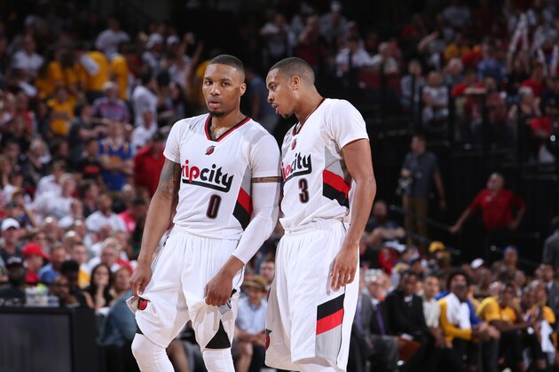 PORTLAND, OR - MAY 7: C.J. McCollum #3 and Damian Lillard #0 of the Portland Trail Blazers talk with each other during the game against the Golden State Warriors in Game Three of the Western Conference Semifinals during the 2016 NBA Playoffs on May 7, 2016 at the Moda Center Arena in Portland, Oregon. NOTE TO USER: User expressly acknowledges and agrees that, by downloading and or using this photograph, user is consenting to the terms and conditions of the Getty Images License Agreement. Mandatory Copyright Notice: Copyright 2016 NBAE (Photo by Sam Forencich/NBAE via Getty Images) PORTLAND, OR - MAY 7: C.J. McCollum #3 and Damian Lillard #0 of the Portland Trail Blazers talk with each other during the game against the Golden State Warriors in Game Three of the Western Conference Semifinals during the 2016 NBA Playoffs on May 7, 2016 at the Moda Center Arena in Portland, Oregon. NOTE TO USER: User expressly acknowledges and agrees that, by downloading and or using this photograph, user is consenting to the terms and conditions of the Getty Images License Agreement. Mandatory Copyright Notice: Copyright 2016 NBAE (Photo by Sam Forencich/NBAE via Getty Images)