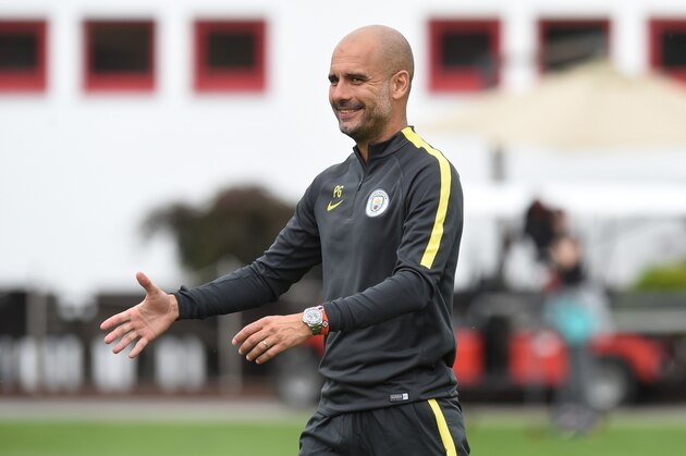 Manchester's new Spanish headcoach Pep Guardiola arrives for a training session of Manchester City at the training ground of the German first division football team FC Bayern Munich in Munich, southern Germany, on July 21, 2016.  / AFP / CHRISTOF STACHE        (Photo credit should read CHRISTOF STACHE/AFP/Getty Images)