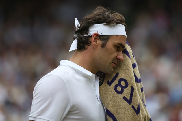 LONDON, ENGLAND - JULY 08:  Roger Federer of Switzerland in action during his defeat by Milos Raonic of Canada in their Gentlemen's Singles Semi-Final match today on day eleven of the Wimbledon Lawn Tennis Championships at the All England Lawn Tennis and Croquet Club on July 08, 2016 in London, England.  (Photo by Stephen White/CameraSport via Getty Images)