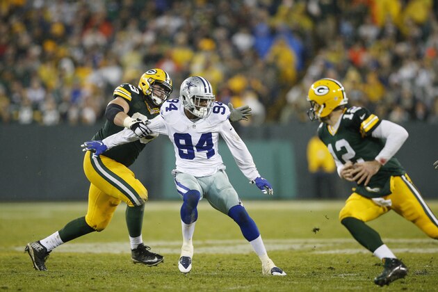 GREEN BAY, WI - DECEMBER 13: Randy Gregory #94 of the Dallas Cowboys in action against the Green Bay Packers during the game at Lambeau Field on December 13, 2015 in Green Bay, Wisconsin. The Packers defeated the Cowboys 28-7. (Photo by Joe Robbins/Getty Images)