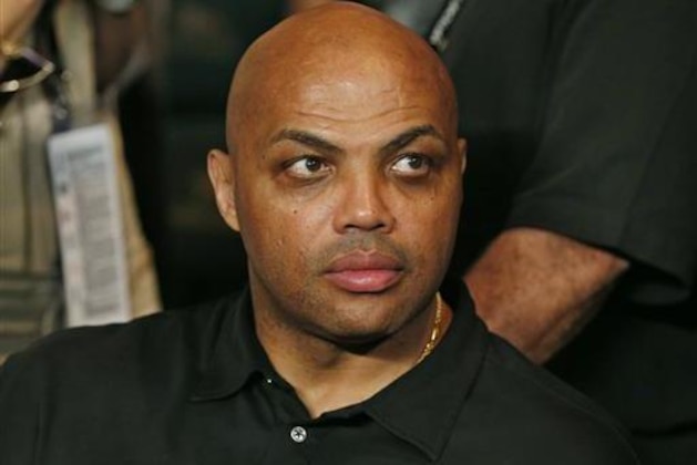FILE - In this May 2, 2015, file photo, Charles Barkley joins the crowd before the start of the world welterweight championship bout between Floyd Mayweather Jr., and Manny Pacquiao in Las Vegas. Barkley told ESPN radio on July 12, 2016, that black people have “got to do better” in response to last week’s shootings of black men by police and a sniper attack that left five officers dead in Dallas.(AP Photo/John Locher, File)