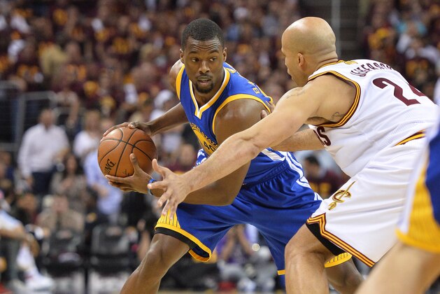 Jun 10, 2016; Cleveland, OH, USA; Golden State Warriors forward Harrison Barnes (40) controls the ball as Cleveland Cavaliers forward Richard Jefferson (24) defends during the first quarter in game four of the NBA Finals at Quicken Loans Arena. Mandatory Credit: Ken Blaze-USA TODAY Sports