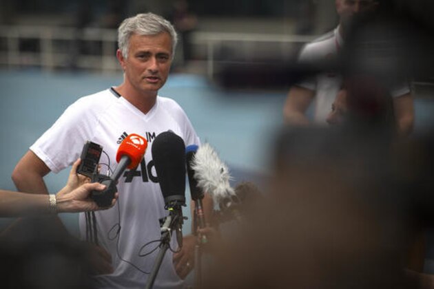 Manchester United manager Jose Mourinho speaks to the media before the team's training session at the Olympic Sports Center Stadium in Beijing, Sunday, July 24, 2016. Manchester United will play a friendly soccer match against Manchester City in Beijing on Monday night. (AP Photo/Mark Schiefelbein)